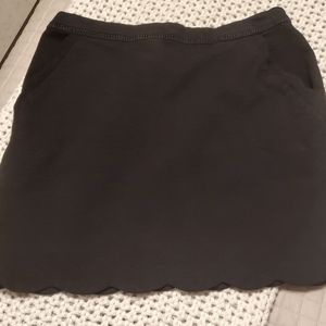 Black skirt with scallop detail